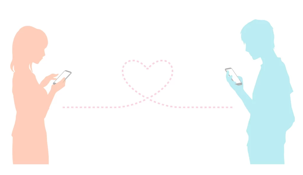 女性のシルエットと男性のシルエットの間にハートの糸