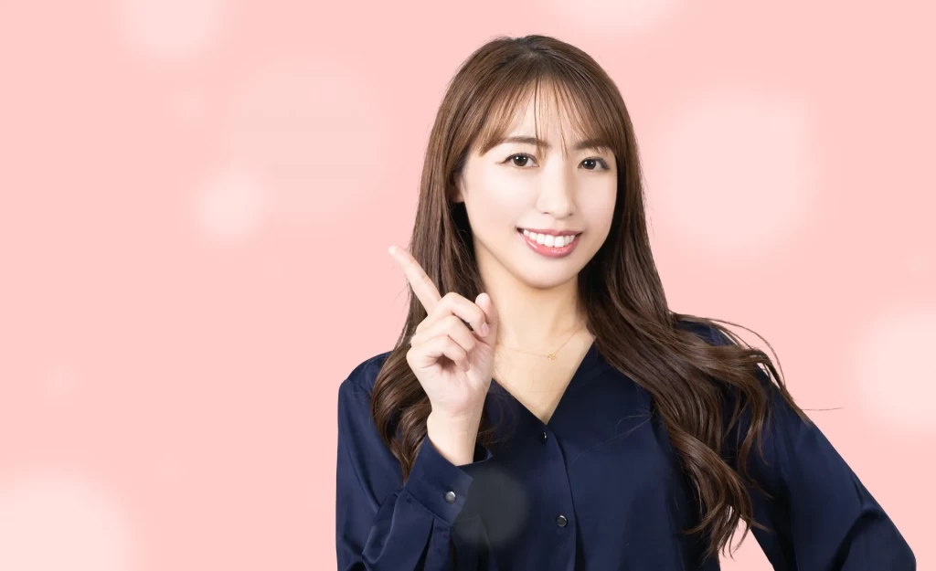 指を上げているきれいな女性