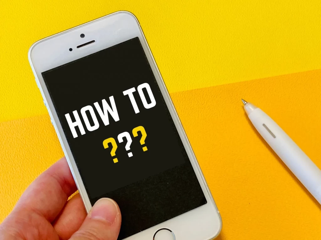 HOW TOと表示されたスマートフォン